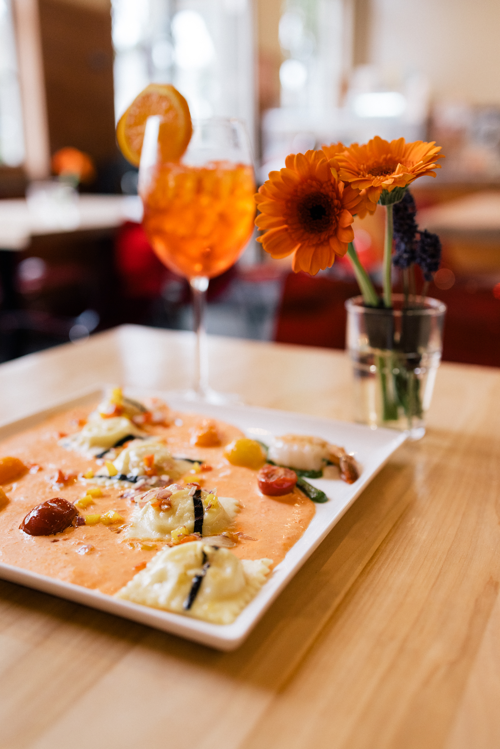 Fresh ravioli plated at the table